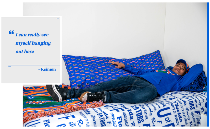 Illustration for article titled We Challenged Two Guys To Decorate A Dorm Room Using Only Fan Merch